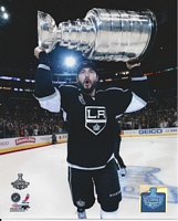 Drew Doughty Los Angeles Kings Autographed 8 x 10 White Jersey Skating  With Puck Photograph